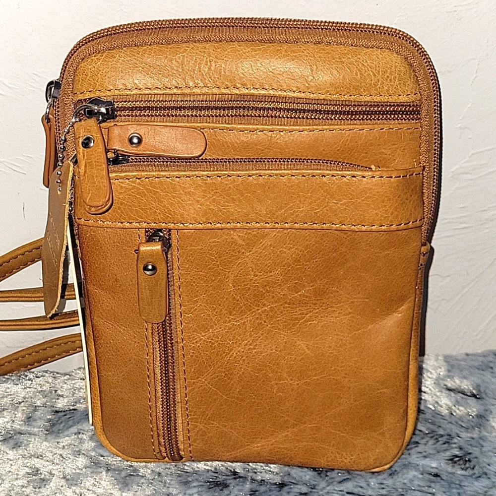 Natural cowhide leather crossbody purse.
